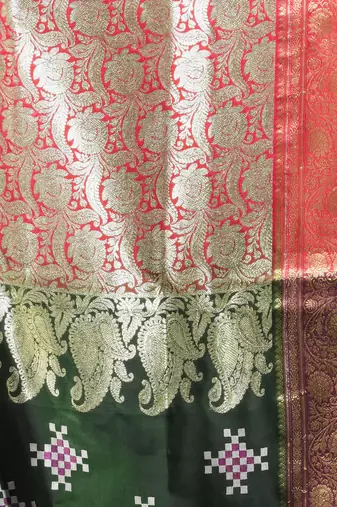 Green embroidered motifs silk saree with zari borders