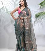 Teal polka dots tissue saree with stripes pallu