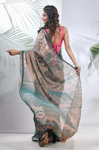 Teal polka dots tissue saree with stripes pallu