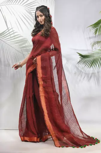 Maroon linen saree with sequined work in stripes