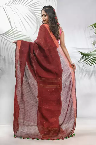 Maroon linen saree with sequined work in stripes