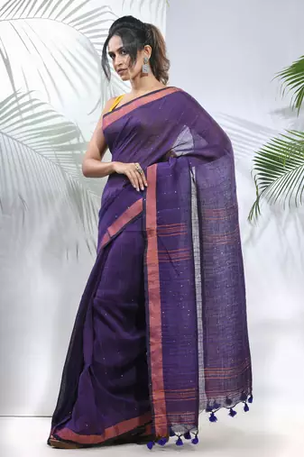 Lilac linen saree with sequined work in stripes