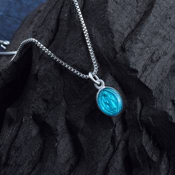 Silver Protective Charm Pendant with Artistic Mother and Child Motif 1
