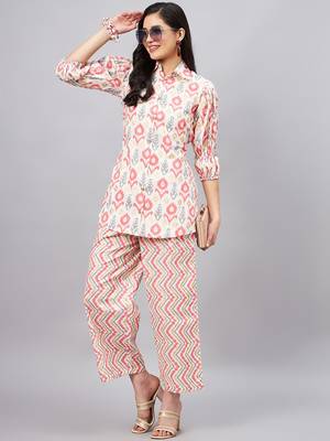Winered woman white and pink front opening collared co-ord set 1