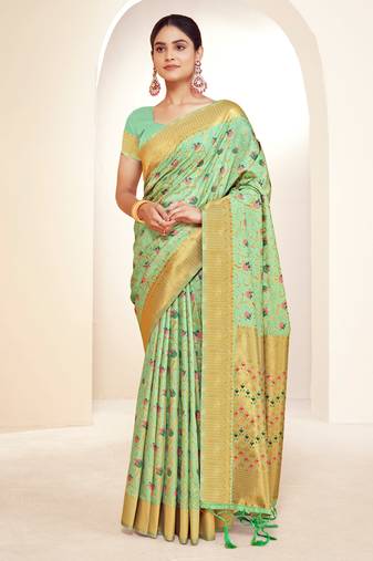 Sangam prints green banarasi silk woven work traditional tassels saree