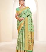 Sangam prints green banarasi silk woven work traditional tassels saree