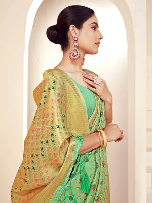 Sangam prints green banarasi silk woven work traditional tassels saree 2
