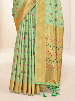Sangam prints green banarasi silk woven work traditional tassels saree 3