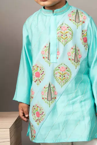Blue silk printed floral kurta and churidar set