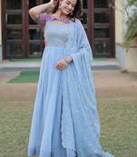 Sky blue faux georgette rich floral position print work gown