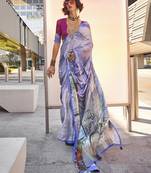 Light blue color swiss satin printed saree with blouse