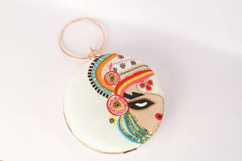 Cream With multi color embellished round shape hand clutch cum sling hanging bag 1