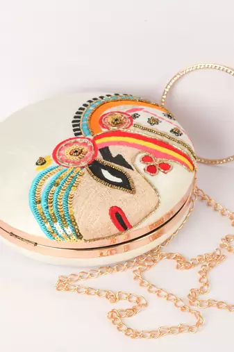 Cream With multi color embellished round shape hand clutch cum sling hanging bag