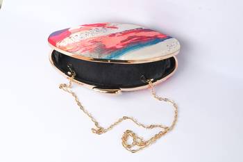 Cream with multi color digital printed designs boat shape hand clutch cum sling bag 1