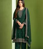 Partywear green colour heavy embroidered georgette suit for trendy looks