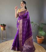 Purple banarasi silk party wear saree with unstitched blouse piece