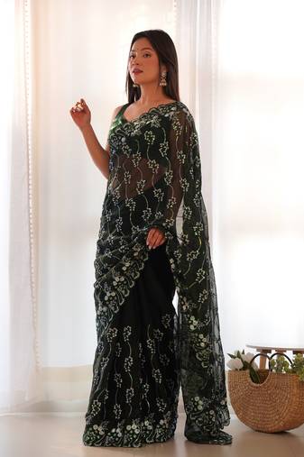 Green embroidered shimmer bollywood saree with blouse piece