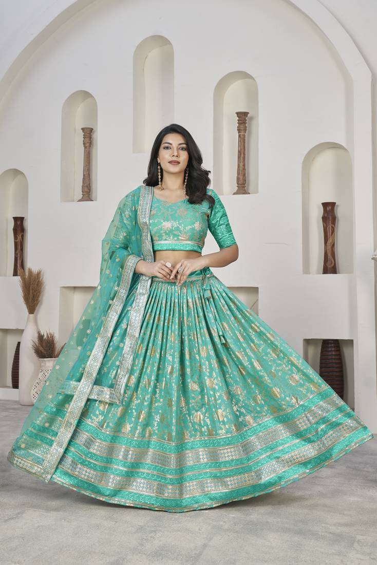 Fetching Sea Green Dola Jacquared Zari Work And Sequins Embroidereded Lehenga Choli For Party