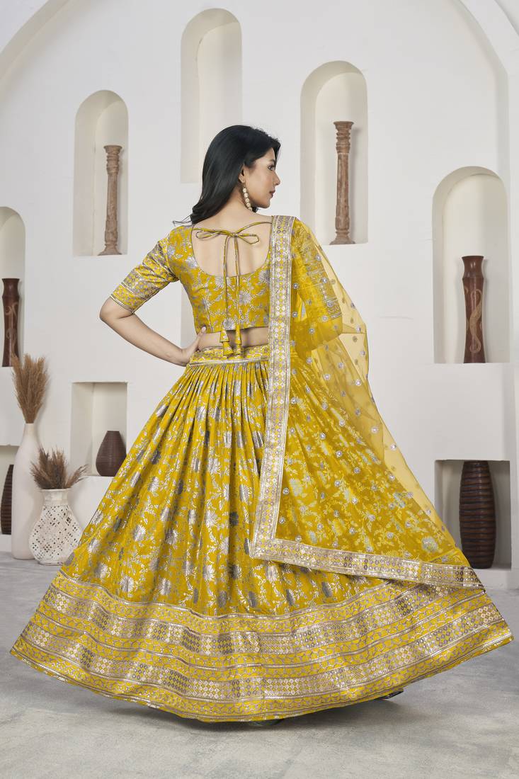 Yellow Dola Jacquared Zari Work And Sequins Embroidereded Lehenga Choli For Festival