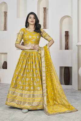 YELLOW ZARI & SEQUINS EMBROIDERED DOLA JACQUARD DESIGNER WEDDING & PARTY WEAR FESTIVAL SEMI STITCHED LEHENGA 1