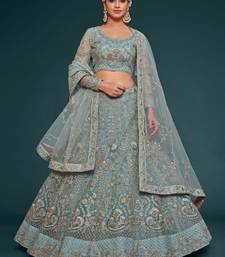 Fetching Ocean Aqua Thread Zari Badla And Glitter Dori Embroidered Net Lehenga Choli For Engagement