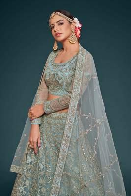 Fetching Ocean Aqua Thread Zari Badla And Glitter Dori Embroidered Net Lehenga Choli For Engagement 3