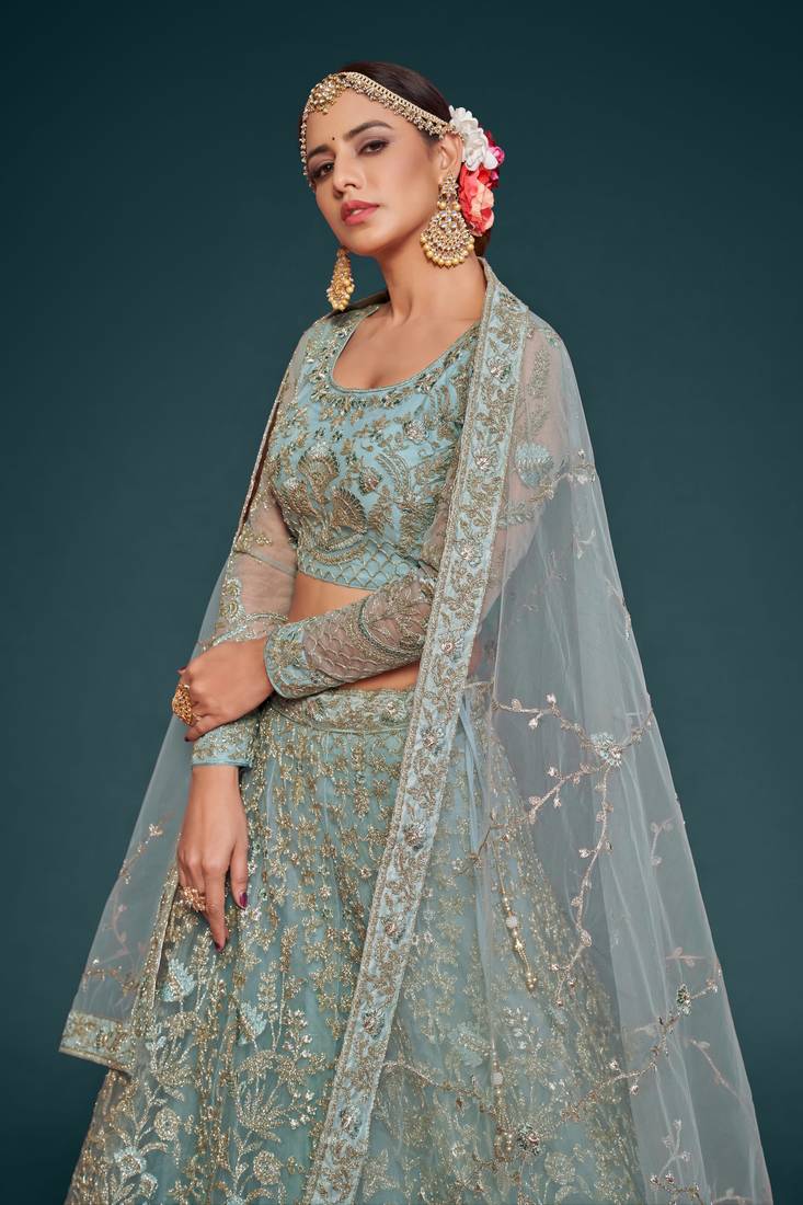 Fetching Ocean Aqua Thread Zari Badla And Glitter Dori Embroidered Net Lehenga Choli For Engagement
