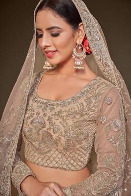  Royal Beige Thread Zari Badla And Glitter Dori Embroidered Net Lehenga Choli For Festival 3