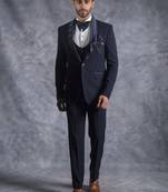 Navy blue tuxedo suit with folded lapel and embroidery