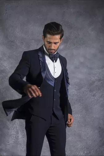 Navy blue tuxedo suit with folded lapel and embroidery