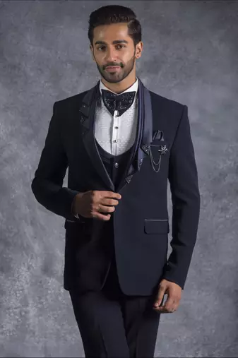 Navy blue tuxedo suit with folded lapel and embroidery