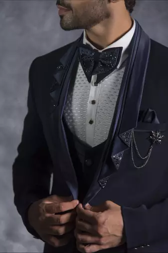 Navy blue tuxedo suit with folded lapel and embroidery