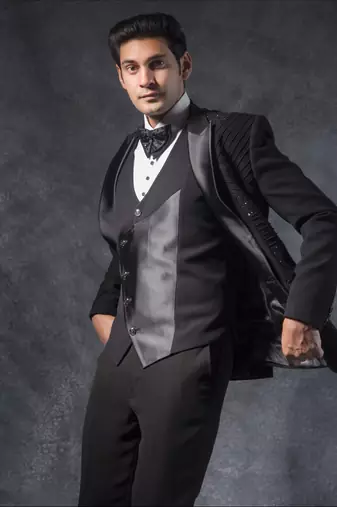 Black tuxedo suit with pintex and swarovski detailing