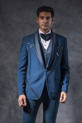 Teal blue tuxedo suit with metal strip detailing 2
