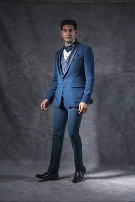 Teal blue tuxedo suit with metal strip detailing 3