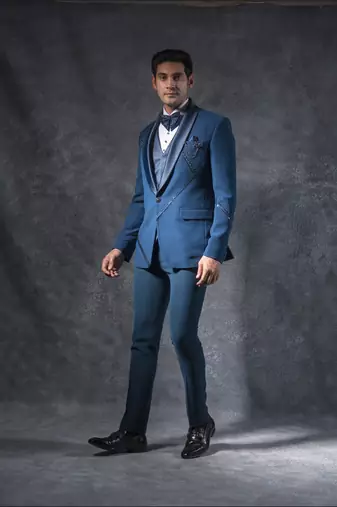 Teal blue tuxedo suit with metal strip detailing