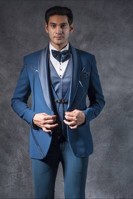 Teal blue tuxedo suit with metal strip detailing 4