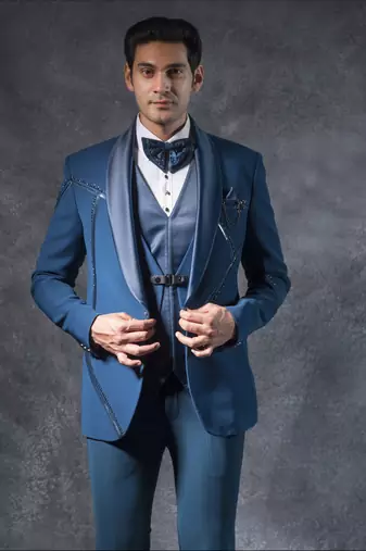 Teal blue tuxedo suit with metal strip detailing