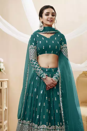 Fetching Teal Blue Zari And Sequins Embroidered Georgette Party Wear Lehenga Choli
