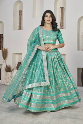 Sea Green Color Dola Jacquard Zari Work Silk Semi-Stitched Lehenga Choli 1