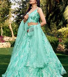 Seductive Blue Multiple Sequins And Thread Embroider Net Lehenga Choli