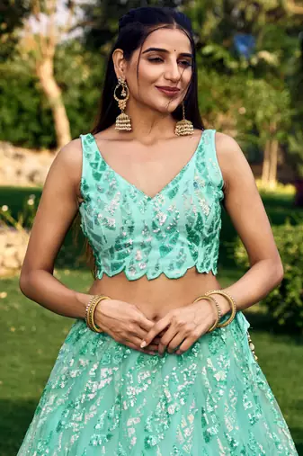 Seductive Blue Multiple Sequins And Thread Embroider Net Lehenga Choli