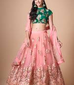 Peach Thread Zari Dori And Sequins Embroidered With Mirror Work Soft Net Lehenga Choli