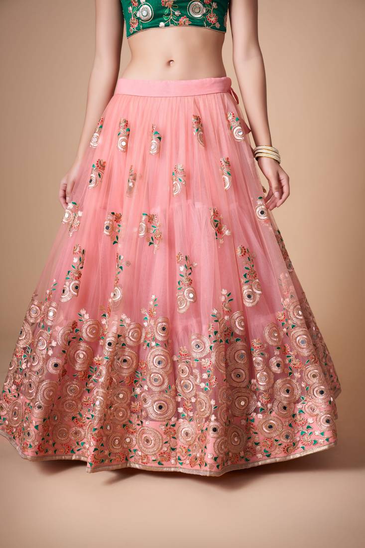 Peach Thread Zari Dori And Sequins Embroidered With Mirror Work Soft Net Lehenga Choli