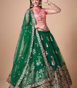 Green Thread Zari Dori And Sequins Embroidered With Mirror Work Soft Net Lehenga Choli For Women