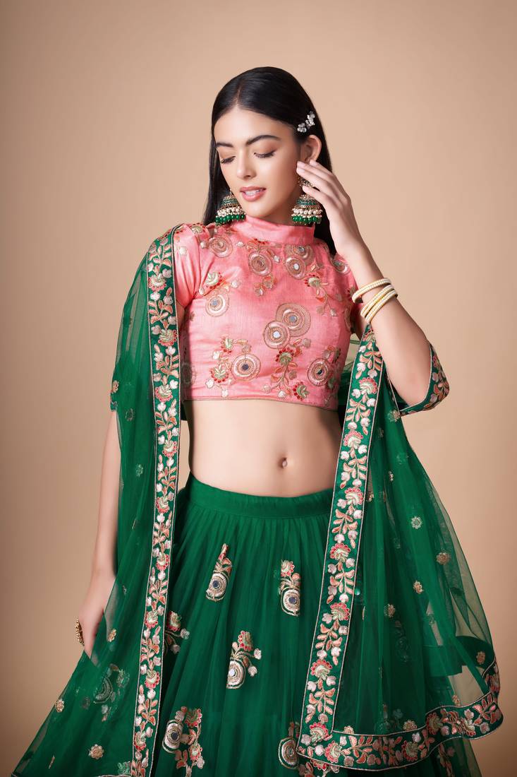 Green Thread Zari Dori And Sequins Embroidered With Mirror Work Soft Net Lehenga Choli For Women