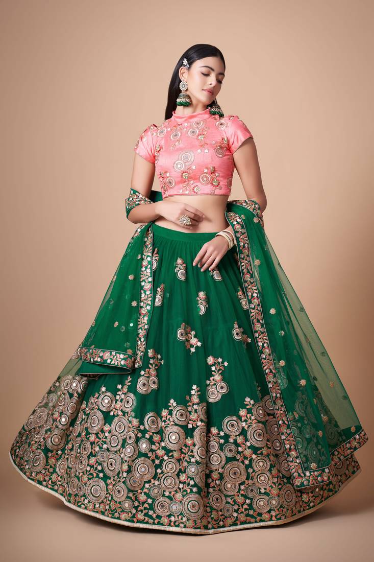 Green Thread Zari Dori And Sequins Embroidered With Mirror Work Soft Net Lehenga Choli For Women