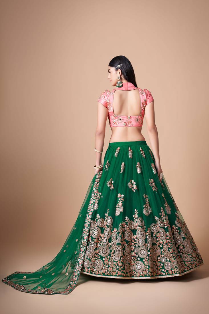 Green Thread Zari Dori And Sequins Embroidered With Mirror Work Soft Net Lehenga Choli For Women
