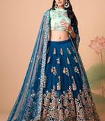 Dove Blue Thread Zari Dori And Sequins Embroidered With Mirror Work Soft Net Lehenga Choli