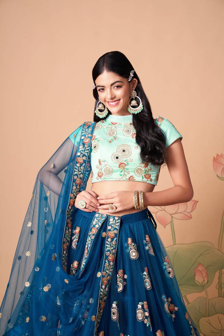 Dove Blue Thread Zari Dori And Sequins Embroidered With Mirror Work Soft Net Lehenga Choli